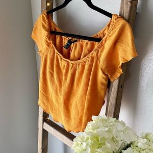 Off the shoulder crop blouse.